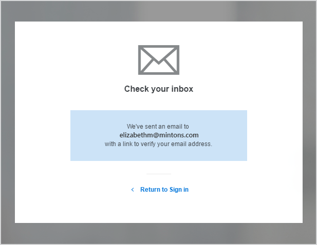 The message says: "Check your inbox. We've sent an email to elizabethm@mintons.com with a link to verify your email address".